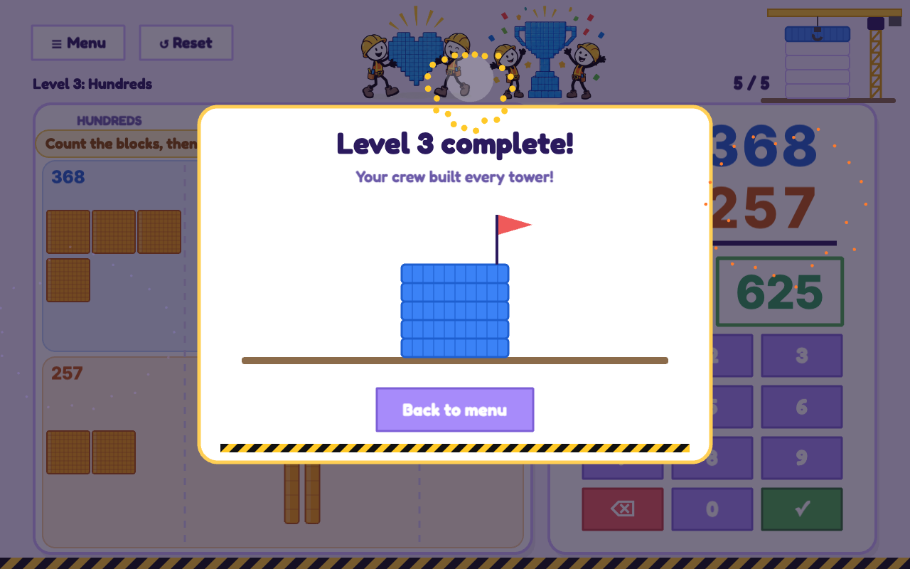 Level 3 complete: the finished tower with a flag on top