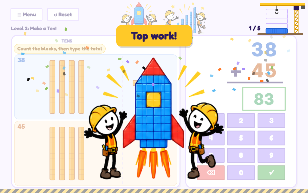 Two cheering builders beside a rocket made of base-ten blocks
